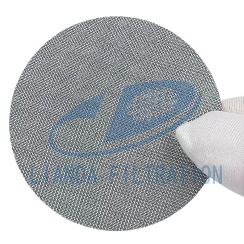 Porous metal filter disc